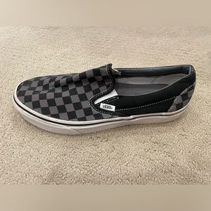 Vans black and gray slip on shoe. Men’s size 7.5 and women’s size 9.